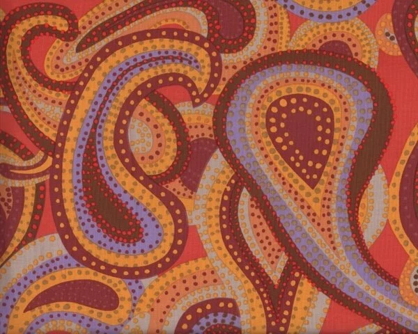 Patchworkstoff "Dancing Paisley" mit großen Punkte-Paisleys, terracotta-braun-goldgelb