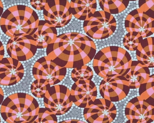 Patchworkstoff "Lou Lou Thi" mit gemusterten Discokugeln und Blubberblasen, aprikot-aubergine